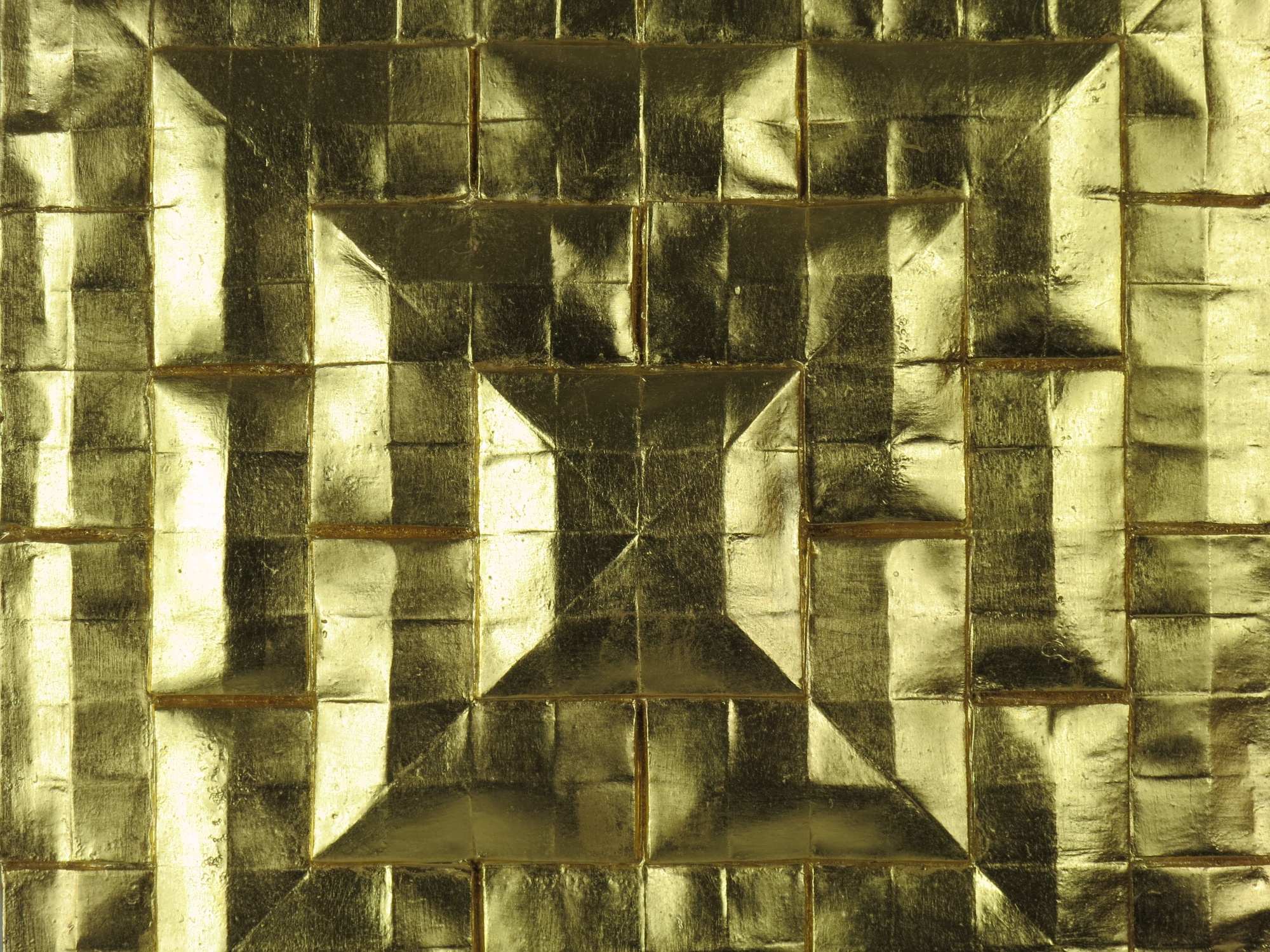 Gilded plaster tile detail.