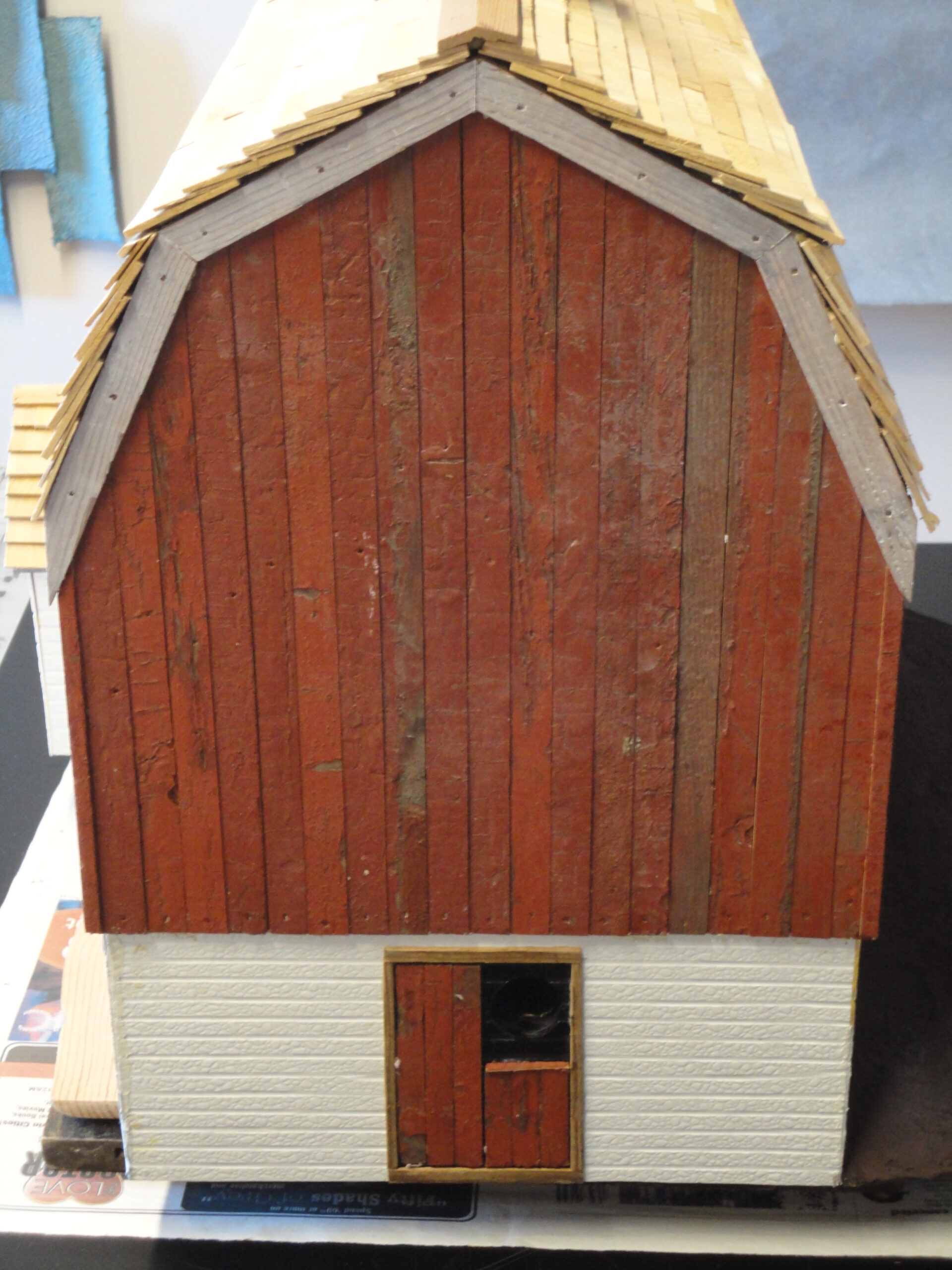 First coat of white paint under the roof.