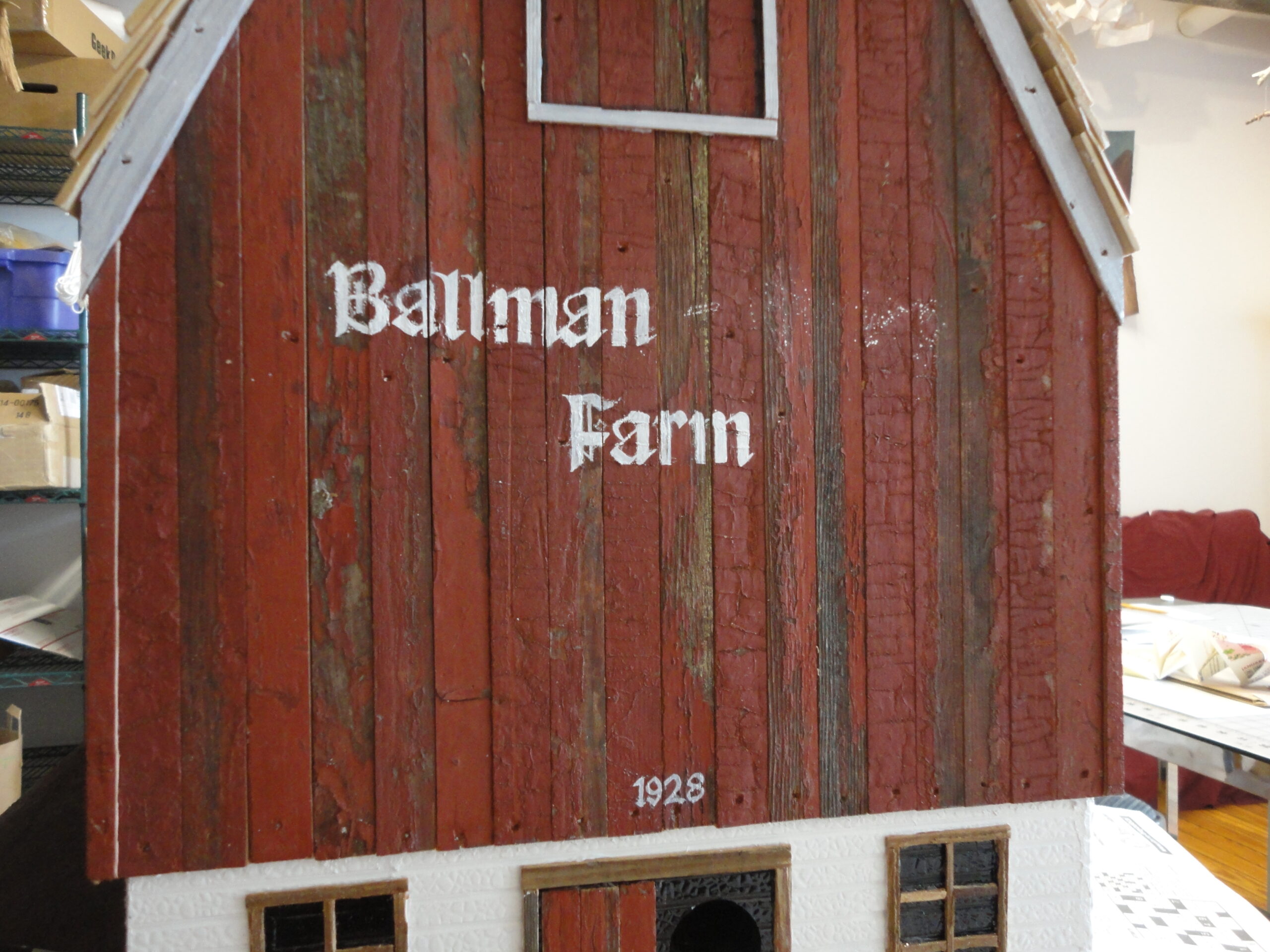 Sign half painted.